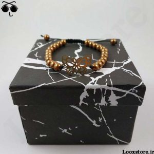 دستبند مهره ای با پلاک پروانه طلایی استیل